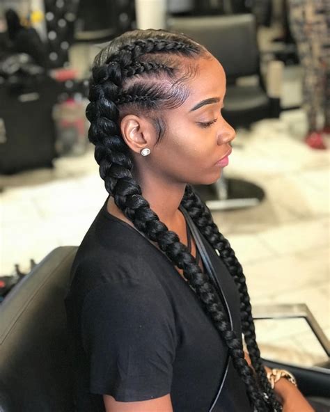 Two-braid hairstyles lead the way for a number of styles that look intricate but are actually really easy to create. . Two big braids hairstyles
